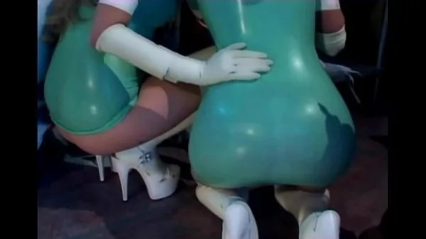 مقاطع فيديو عالية الدقة Threesome with nurses in latex lingerie and gloves