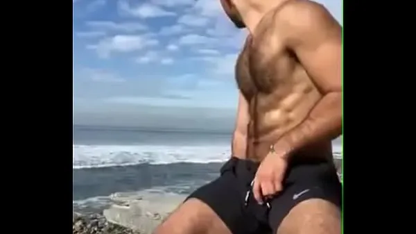 Videa s výkonem jerking off at the beach HD
